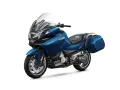 Motocicleta azul CFMOTO 1250 TR-G con maletas laterales, lista para la aventura.