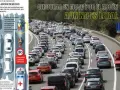Un atasco kilométrico en la autopista. La imagen muestra que circular en moto por el arcén aún no es legal, a pesar de la tentación de esquivar el tráfico.