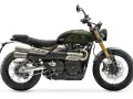La Triumph Scrambler 900, lista para la aventura. Su diseño robusto y el motor de 900cc prometen un triunfo en cada camino.