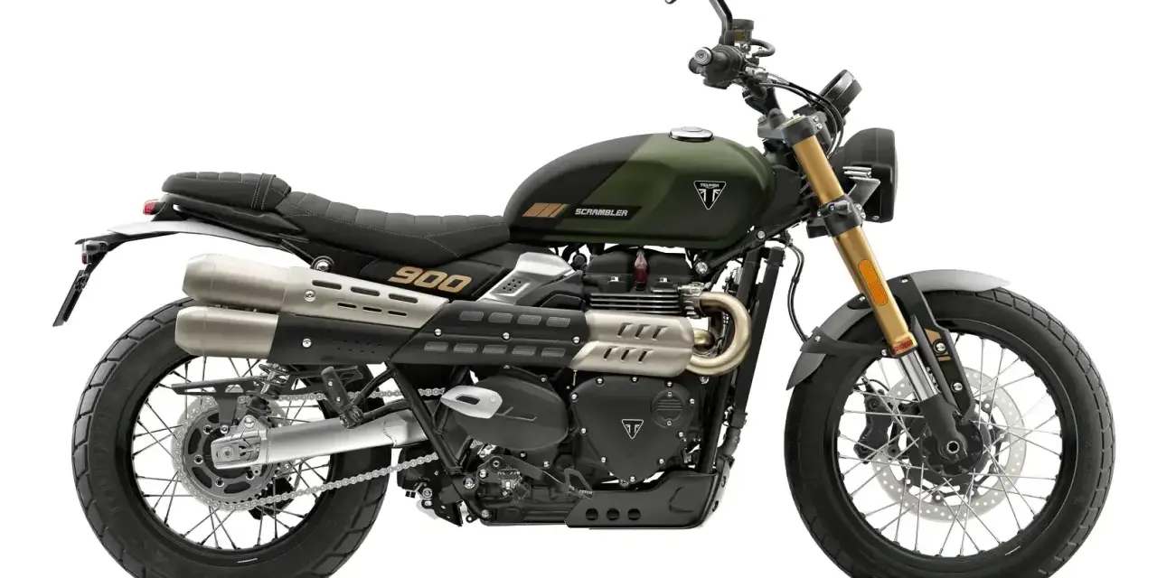 La Triumph Scrambler 900, lista para la aventura. Su diseño robusto y el motor de 900cc prometen un triunfo en cada camino.