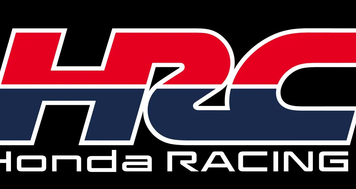 Logo HRC Honda Racing en colores rojo, azul y blanco sobre fondo negro.