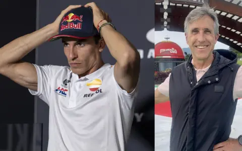 Marc Márquez con gorra Red Bull y un hombre sonriente, quizás Ricard Jove, con chaleco negro.