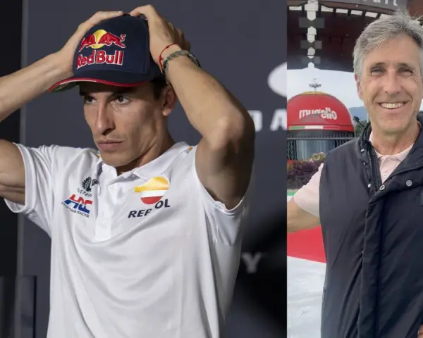 Marc Márquez con gorra Red Bull y un hombre sonriente, quizás Ricard Jove, con chaleco negro.