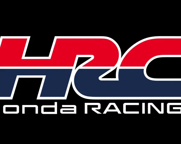 Logo HRC Honda Racing en colores rojo, azul y blanco sobre fondo negro.