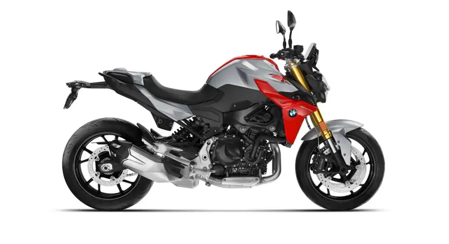 Moto BMW deportiva, ideal para limitar moto A2. Diseño moderno en plata y rojo, con detalles plateados y negros.